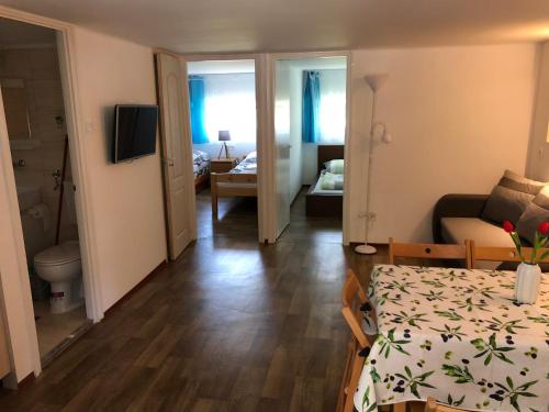 Postel nebo postele na pokoji v ubytování Schmidt Apartman 2.