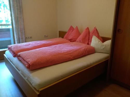 das Luggi Appartementsにあるベッド