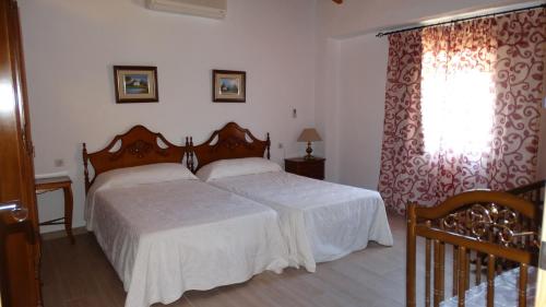 Katil atau katil-katil dalam bilik di Casa Rural Casa Pepe