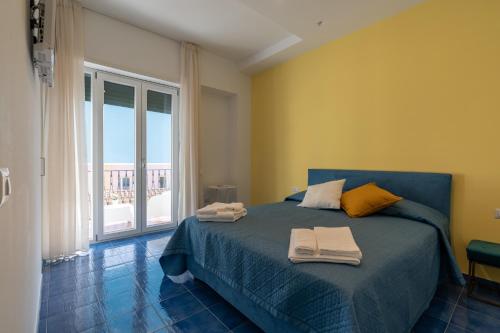 Posteľ alebo postele v izbe v ubytovaní Panoramic Terrazza - Località Maiori