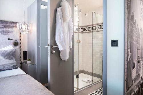 Ванная комната в Hotel Monsieur & Spa