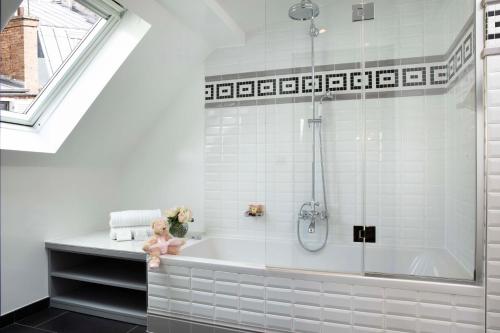 Ванная комната в Hotel Monsieur & Spa