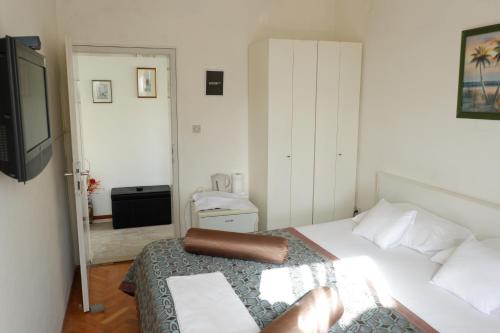 Cama o camas de una habitación en Epidaurum Apartments