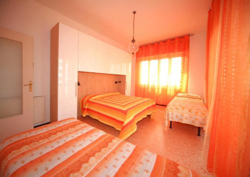 Łóżko lub łóżka w pokoju w obiekcie Sapore di Sale
