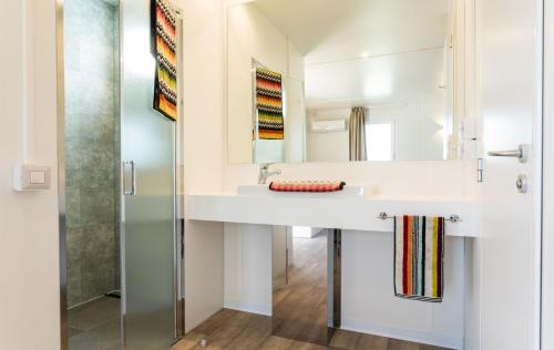 a bathroom with a sink and a shower at Camping Village Roma Capitol in Lido di Ostia