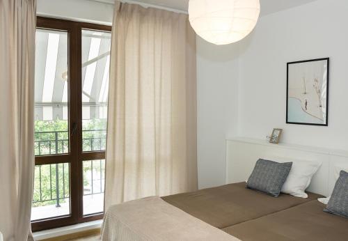 Кровать или кровати в номере Stylish Retreat / High-end Flat / Varna Downtown