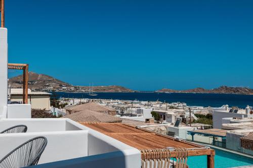 a view of a city from the roof of a building at Bohemian Luxury Boutique Hotel, Adults Only in Naousa