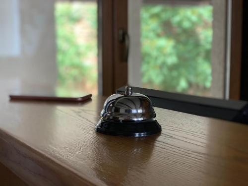 a helmet sitting on top of a wooden table at Shpinat in Odesa