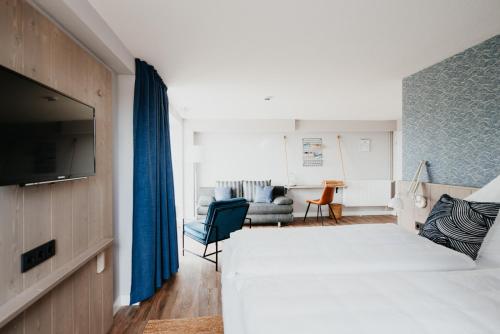 Postel nebo postele na pokoji v ubytování Siel59 Hotel & Restaurant