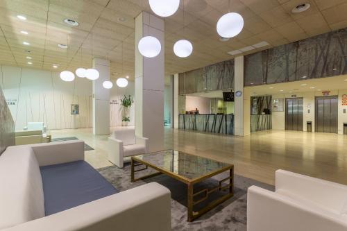 Χώρος καθιστικού στο Hotel Izán Cavanna