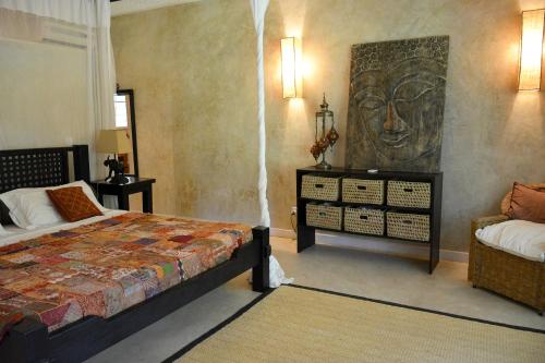 Ein Bett oder Betten in einem Zimmer der Unterkunft The Lawford Hotel