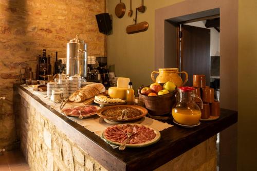 a table with food on top of a counter at La Rimbecca Greve in Chianti in Greve in Chianti