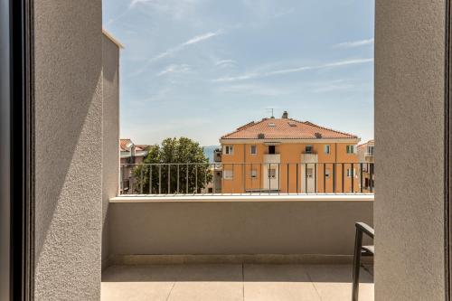 a view of a building from a balcony at 2NIGHTSTUDIOS in Split