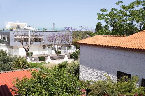 an overhead view of a city with buildings and trees at Villa Elisabetta Apartments in Pula