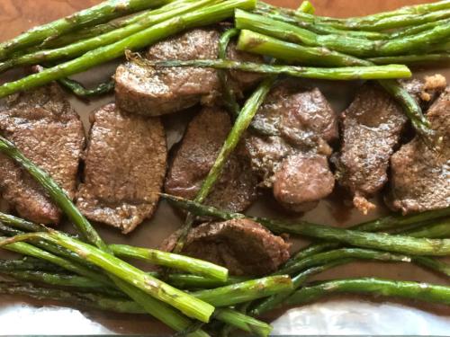 a plate of food with green beans and meat at HOTEL N1 in Yerevan