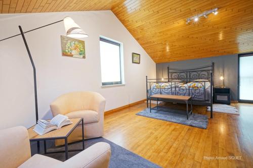Postel nebo postele na pokoji v ubytování Gîte les gadlis