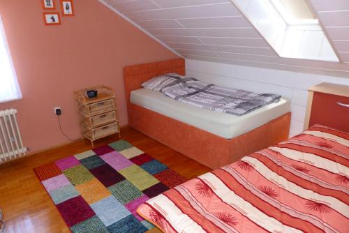 Krevet ili kreveti u jedinici u okviru objekta Apartment with a view - Daheim am Wasserturm