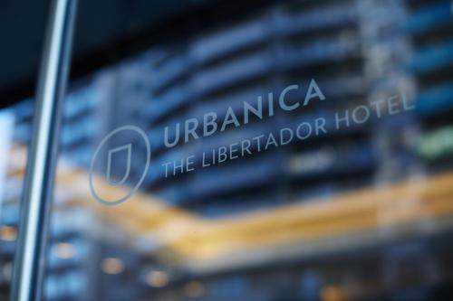 a sign in front of a building at Urbanica The Libertador Hotel in Buenos Aires