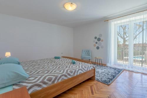 Postel nebo postele na pokoji v ubytování Villa John