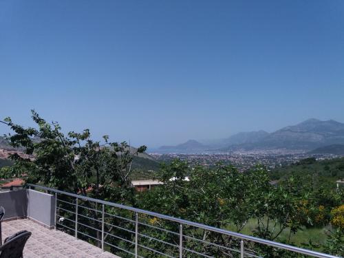 a balcony with a view of a city at Zelena Maslina in Bar