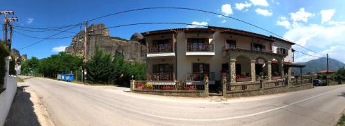 a building on the side of a road at Guesthouse Vavitsas in Kalabaka