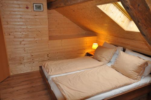 Postel nebo postele na pokoji v ubytování Kärnten Appartements