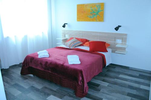 Ένα ή περισσότερα κρεβάτια σε δωμάτιο στο LA CASCINA DEL VIAGGIATORE