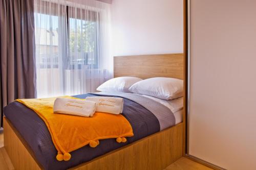 Postel nebo postele na pokoji v ubytování Apartamenty Natalia - bezpłatny parking