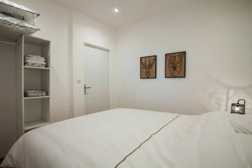 Katil atau katil-katil dalam bilik di Legend - Le Saint Laurent - Parking - Wifi - 24/7 - cosy