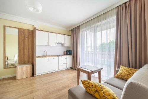 Kuchyňa alebo kuchynka v ubytovaní Apartamenty Fregata