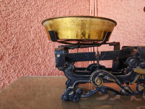 a close up of a sewing machine with a bucket at Kalokenti Studios in Aegina Town