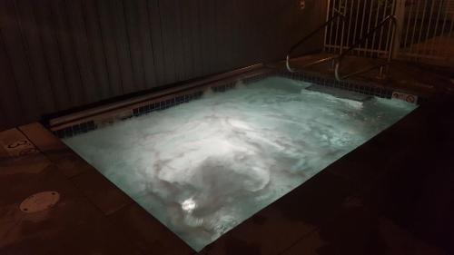 an overhead view of a hot tub filled with snow at Homestead Suites - Fish Creek in Fish Creek
