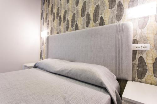 Una cama o camas en una habitación de B&B Maria Rosaria
