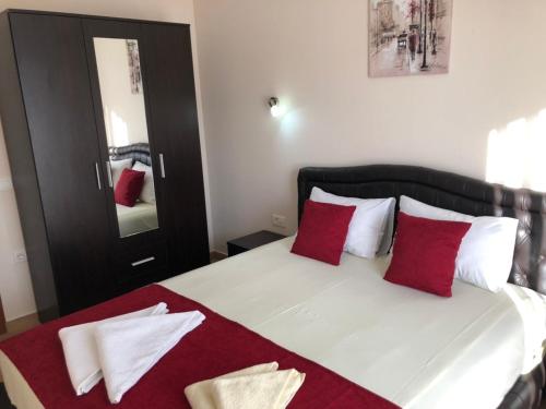 Postel nebo postele na pokoji v ubytování Moonlight Apartments