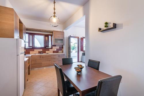 Kuchyň nebo kuchyňský kout v ubytování Rhenea Resort