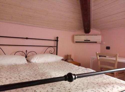 מיטה או מיטות בחדר ב-CASA VACANZE ETNA COUNTRY
