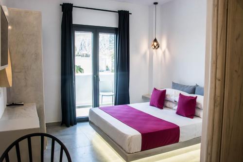 Postel nebo postele na pokoji v ubytování Dragonfly Villas