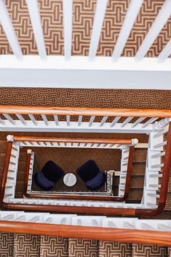 an overhead view of a table with two pillows at The Buxton in London