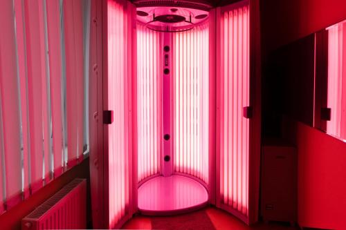 a room with pink lights in a building at Aqualife Spa hotel on Leninskogo Komsomola in Cheboksary