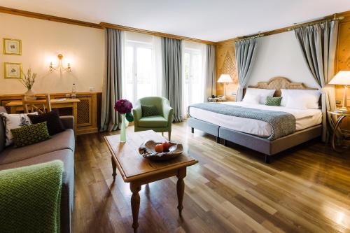 Postel nebo postele na pokoji v ubytování Boutique Hotel SEITNER HOF München Pullach