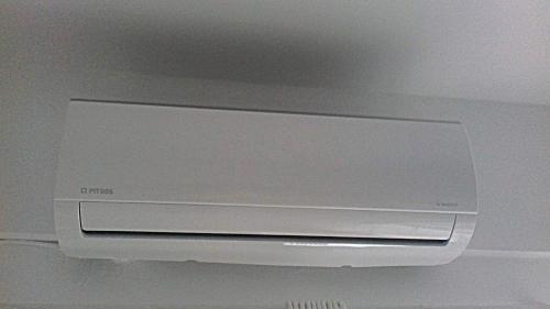a dvd player on top of a tv on a ceiling at Central Studio 1 in Heraklio
