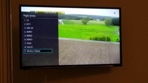 a television screen with a screenshot of a golf course at Apartment Irena in Premantura