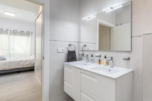 A bathroom at Luxury Beach Front Apartment with Pool