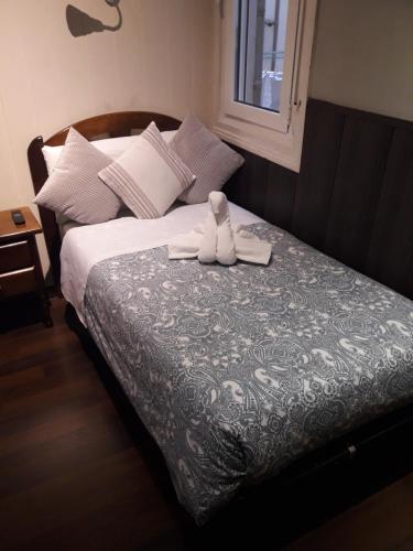 Letto o letti in una camera di New Go Inn