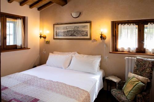 Кровать или кровати в номере All'Antica Mattonata
