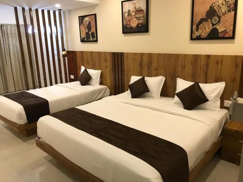 Ένα ή περισσότερα κρεβάτια σε δωμάτιο στο Apollostay