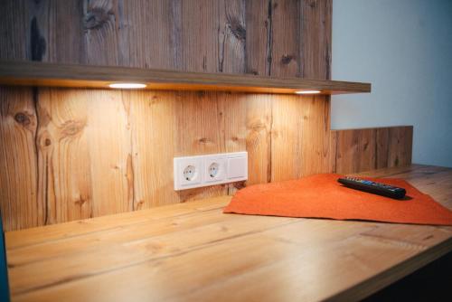 a pen sitting on top of a wooden table at Gasthaus Stroh in Buchholz