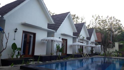 Πισίνα στο ή κοντά στο PITAMATA VILLAS