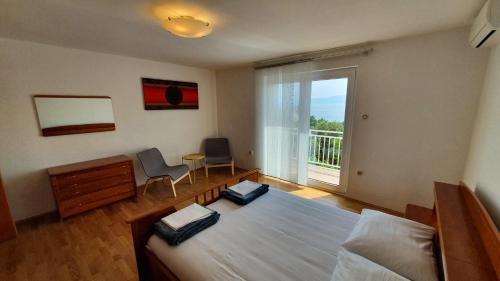 Postel nebo postele na pokoji v ubytování Apartment Bella Mare