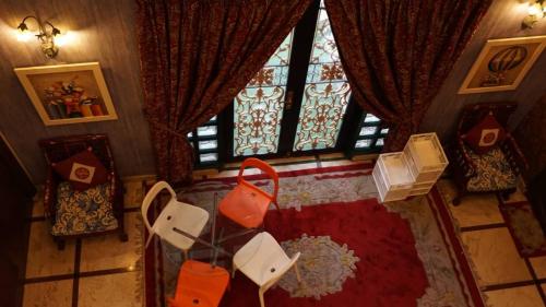 an overhead view of a living room with a window at Kinta Bali Villa in Ipoh